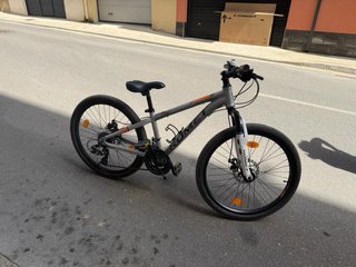 Bicicleta Romet Plata y Naranja