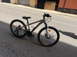 Bicicleta Romet Plata y Naranja