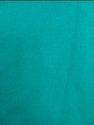 Jersey verde cuello tortuga