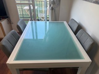 Mesa de comedor extensible de cristal y madera