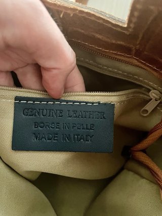 Bolso piel marrón flecos
