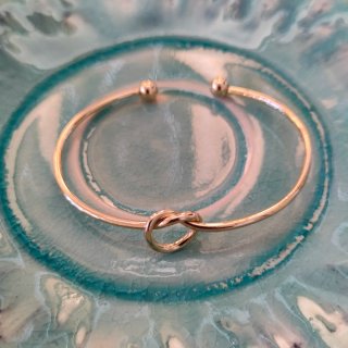 Pulsera dorada acero inoxidable nudo
