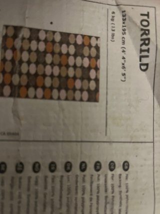 Alfombra de lana con diseño geométrico