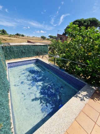 Casa de campo con apartamento y terreno