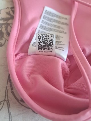 Top deportivo Reebok rosa