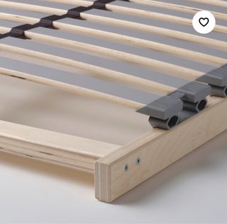 Cama individual blanca con cajones