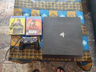 Consola PS4 Pro Negra + 1 mando + 2 Juegos