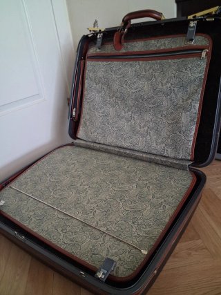 Maleta rígida Samsonite negra y cuero