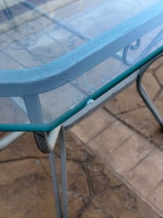 Conjunto mesa jardín cristal y 4 sillones forja