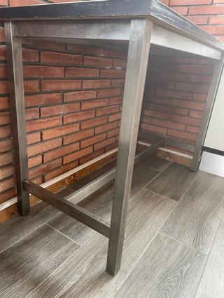 Mesa negra patas acero inoxidable