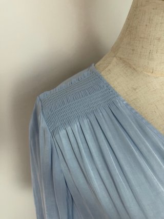 Blusa IKKS azul con detalles blancos