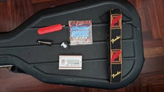 Guitarra Acústica Fender con estuche rígido.