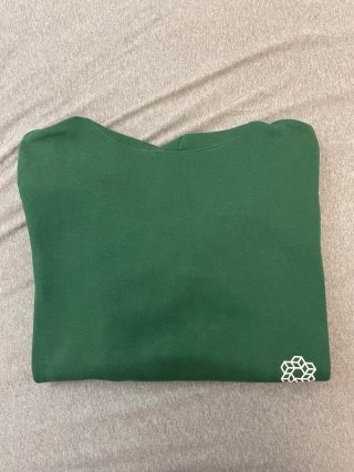 Sudadera H&M verde con estampado