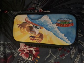Nintendo Switch con Mario Kart, funda y cargador