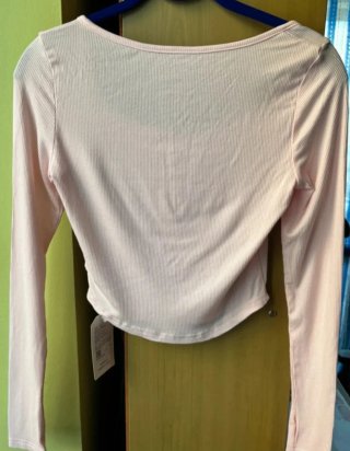 Crop top manica lunga con  fiocco coquette