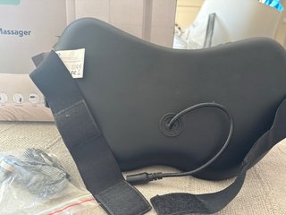 Almohada de masaje con calor xa cargar en el coche