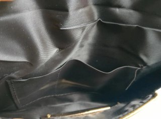 Bolso de fiesta negro y dorado