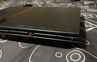 PS2 Slim Sony Negra + Mando + Tarjeta Memoria