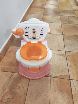 Orinal infantil rosa y blanco
