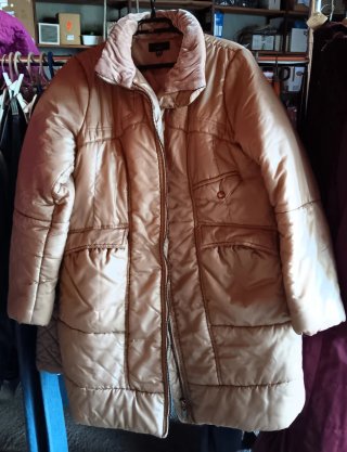 Plumas mujer beige