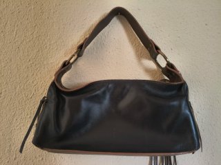 Bolso Tous juvenil negro y marrón