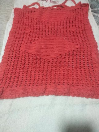 Bolso tejido a mano color coral