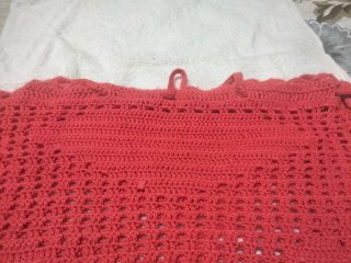 Bolso tejido a mano color coral