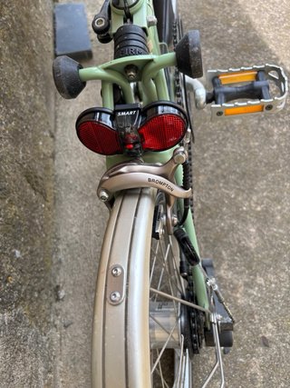 Bicicleta Brompton plegable verde