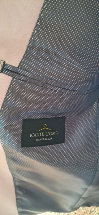 Traje de hombre rosa