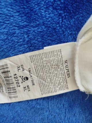 Camiseta Scalpers blanca con calavera