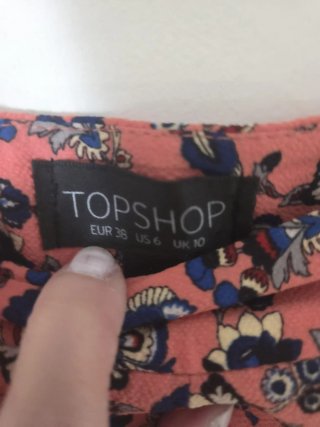Pantalón estampado floral coral