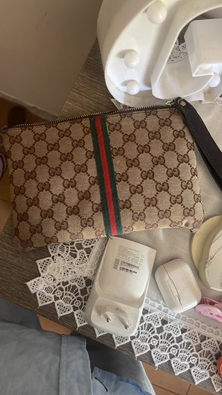 Pochette Gucci monogramma marrone