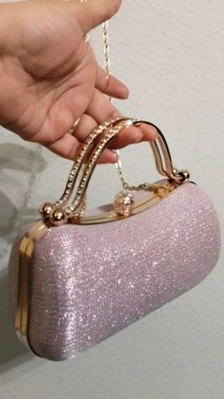 Bolso fiesta rosa con pedrería y asa dorada