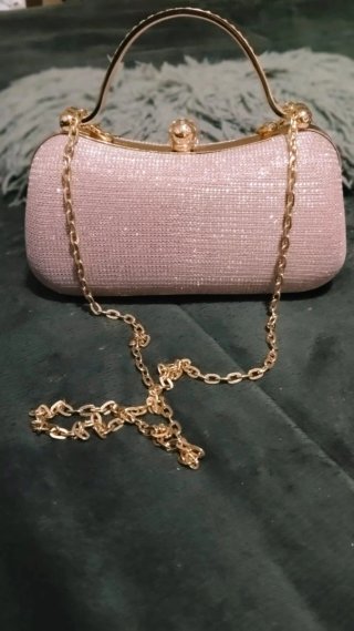 Bolso fiesta rosa con pedrería y asa dorada