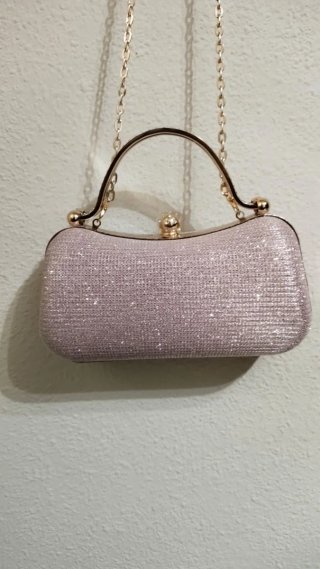 Bolso fiesta rosa con pedrería y asa dorada