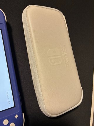 Nintendo Switch Lite Azul + Tomodachi life