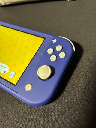 Nintendo Switch Lite Azul + Tomodachi life