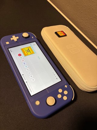 Nintendo Switch Lite Azul + Tomodachi life