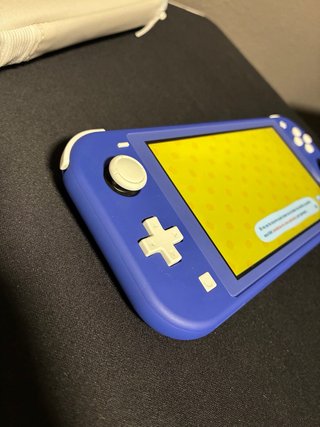 Nintendo Switch Lite Azul + Tomodachi life