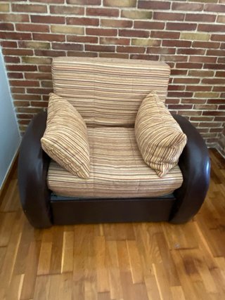 Sillón cama beige y marrón