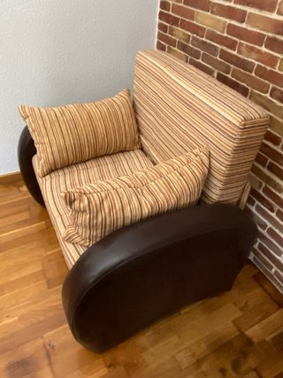 Sillón cama beige y marrón