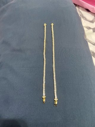 Pulsera de diamantes dorada para hombre y mujer.