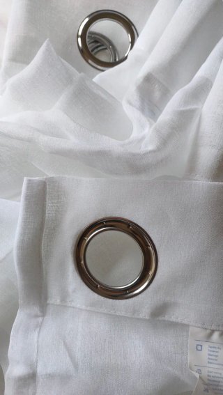 Set di 2 tende a 4 pannelli bianche e trasparenti. Ideali per aggiungere luce ed eleganza.