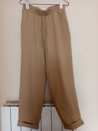 Pantalones anchos beige
