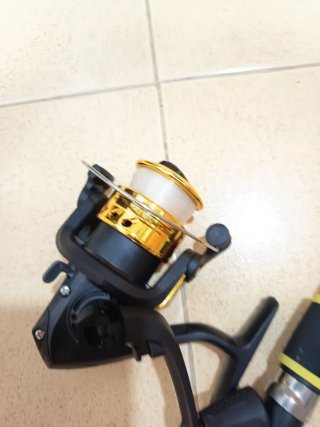 Dos Cañas de pescar 1.80m con carrete y accesorios