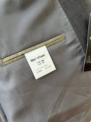 Traje de hombre plateado