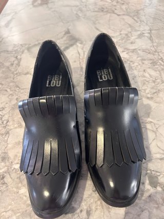 Mocasines Bibi Lou negros con flecos