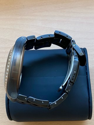 Reloj Swatch Negro y Plateado
