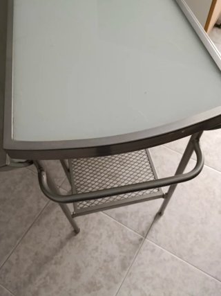 Mesa redonda, cristal , plegable.