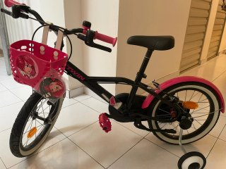 Bicicleta infantil B'TWIN rosa 16 con ruedines